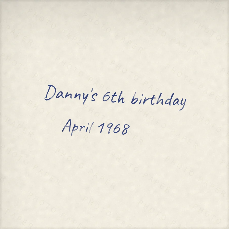 The back of a photo print with a handwritten note reading Danny's 6th birthday, April 1968.