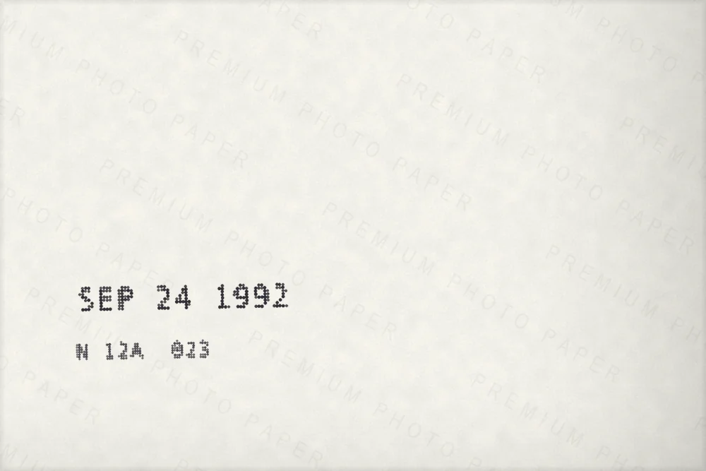 The back of a photo print, machine-printed by the lab with the date SEP 24 1992 and a frame code.