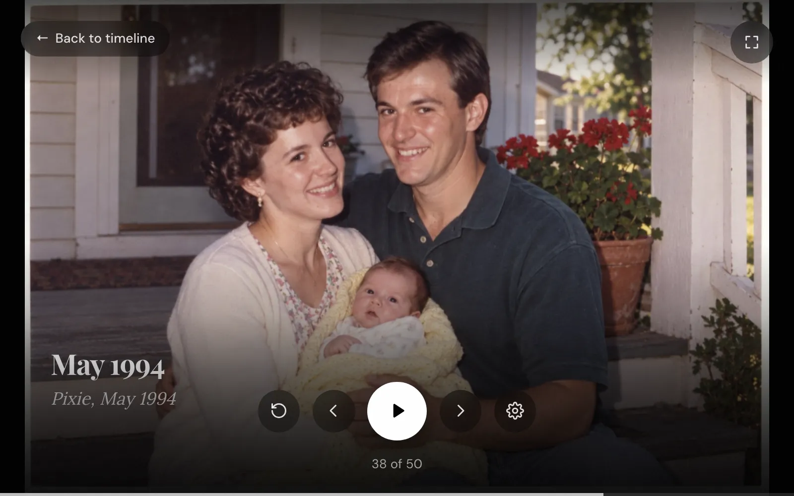 Timeline Scan's slideshow paused on a May 1994 photo of a couple holding their baby on a porch, captioned May 1994 and, from the back of the print, Pixie, May 1994, with the controls and the count 38 of 50